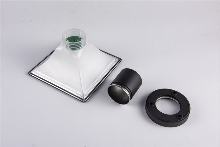 Square opaque lamp head, detached sleeve and round flange on white
