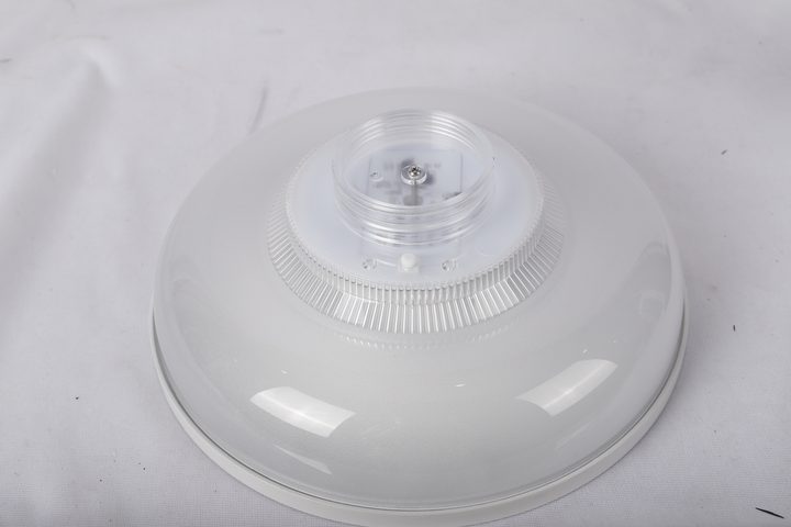 Round white lamp underside and transparent connection collar