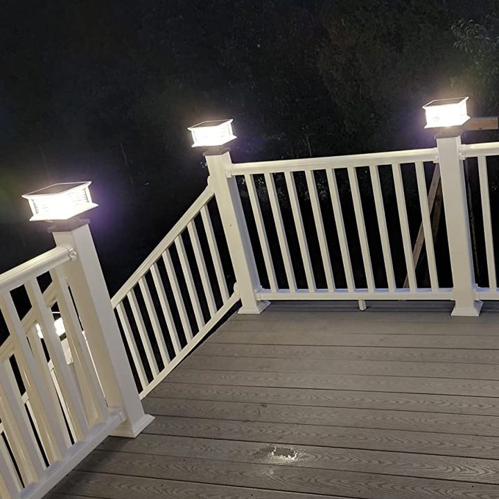 Factory-supplied reference showing square lamps illuminated on deck railing posts.