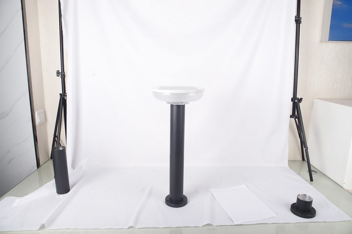 Round-head lamp pictured beside separate threaded post and base components.