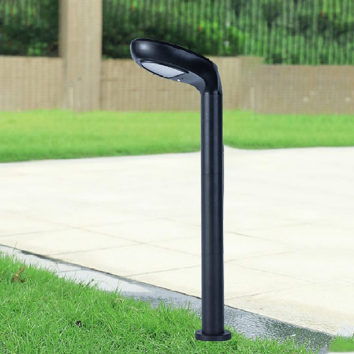 Illustration of a curved-head lamp beside grass and a paved path.