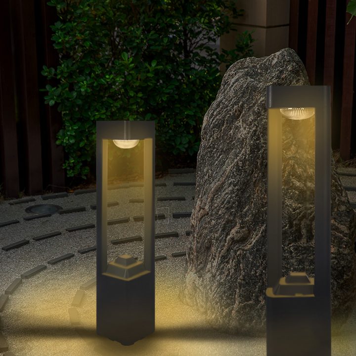 Illustration of open-frame bollards beside a garden rock.