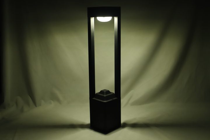 SG-6 solar garden light pictured illuminated in a studio