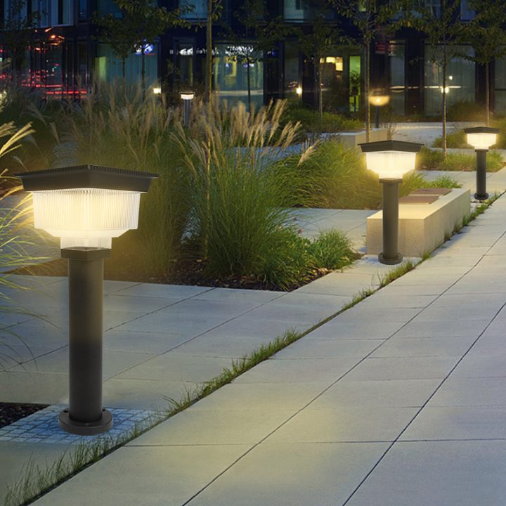 Solar Gate and Pillar Light (SG-9) square solar lights illuminating a landscaped walkway